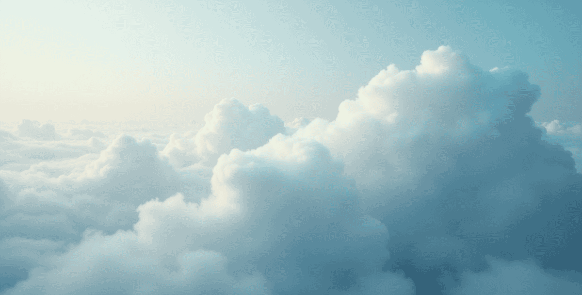 Clouds in a soft blue sky.