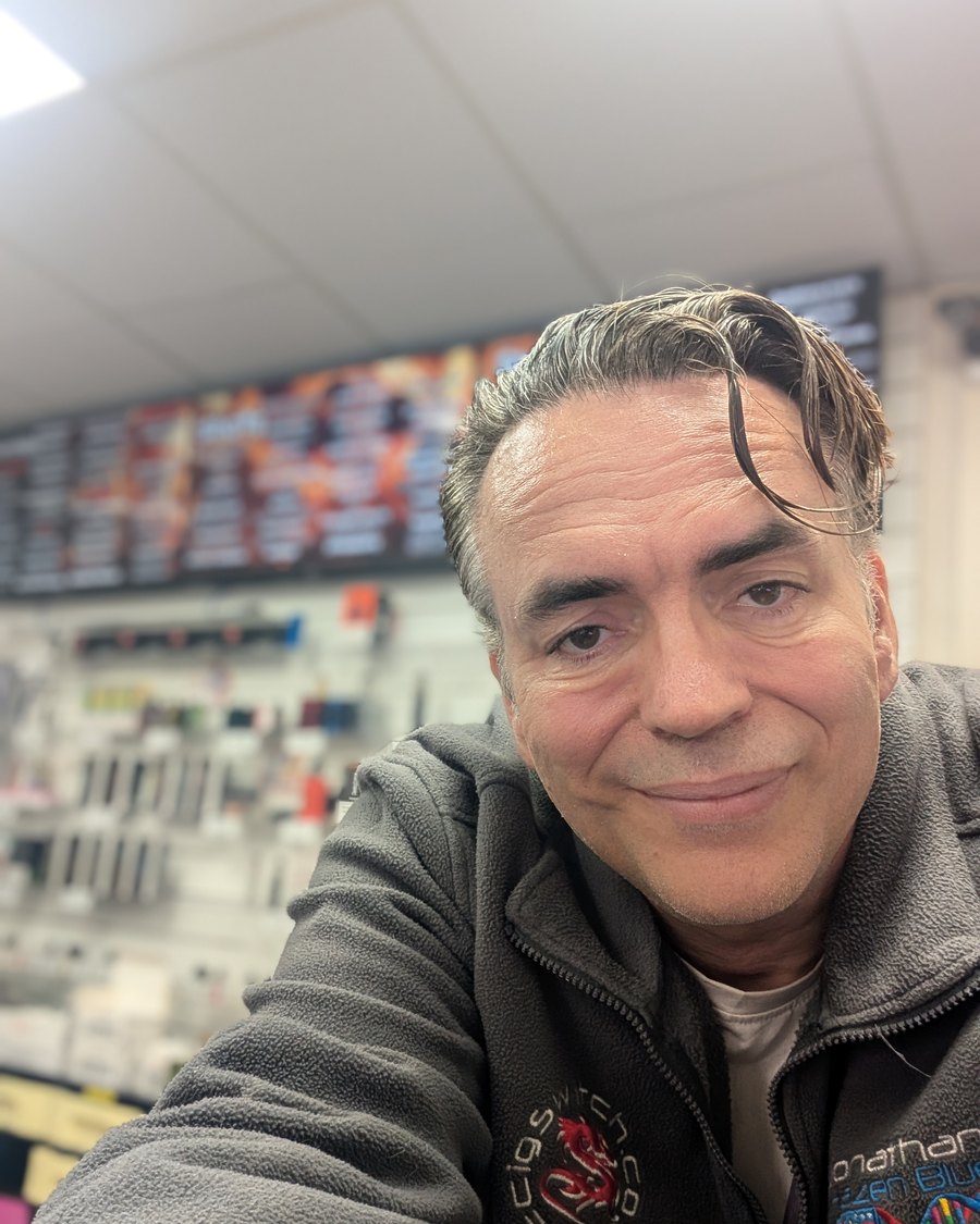 Jonathan Terrington behind the counter at Ecig Switch